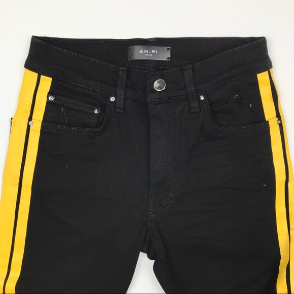 black and yellow amiri jeans